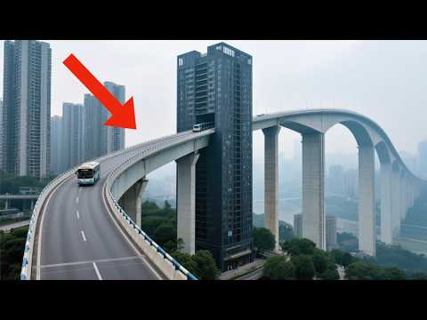 Видео: Прокатитесь на автобусе по самому безумному 30-этажному путепроводу Китая