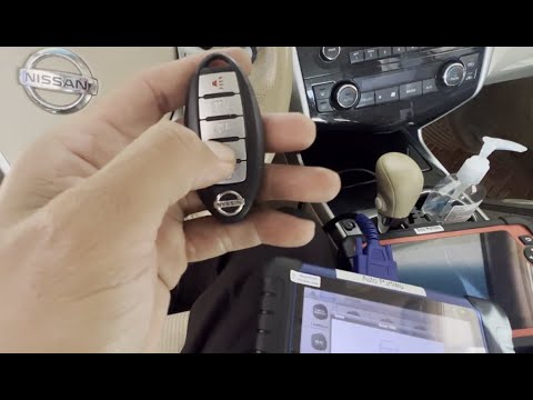 Видео: Как запрограммировать смарт-брелок для запуска двигателя с помощью Autel IM508 на Nissan Altima A...