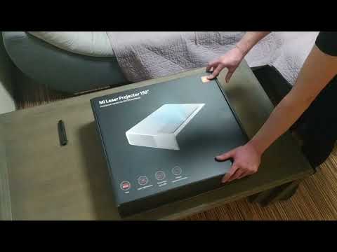 Видео: Распаковка и подключение/Unboxing -  Mi laser projector 150"