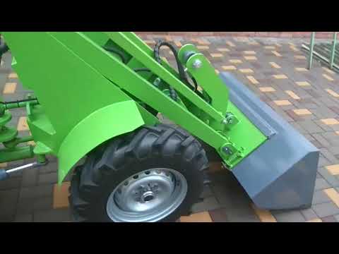 Видео: Работа гидравлики самодельного мини погрузчика.