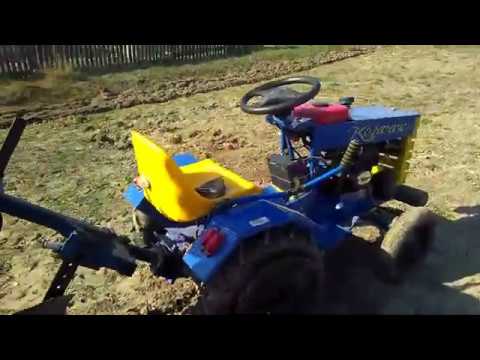 Видео: Вспашка огорода минитрактором, первый раз испытываем плуг. Культивируем целину.