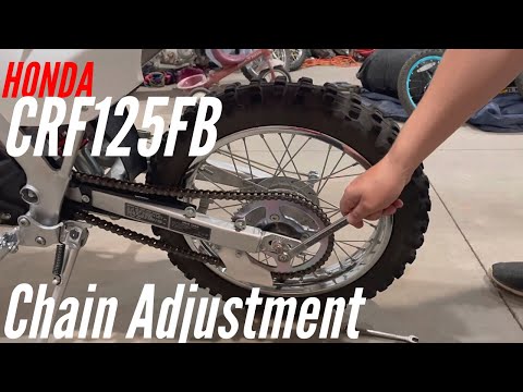 Видео: РЕГУЛИРОВКА ЦЕПИ - Honda CRF125FB 2021 (Видео №12)