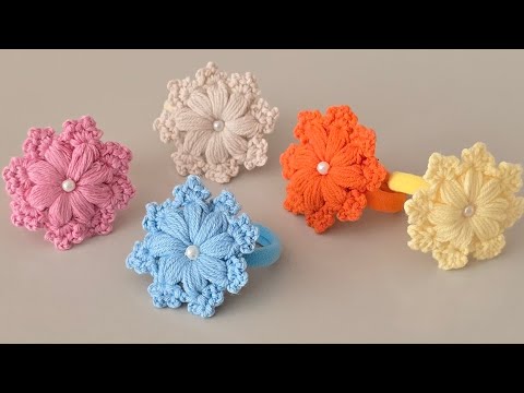Видео: 🌸 Простая вязаная крючком резинка для волос в виде ромашки, которая покорила Интернет!