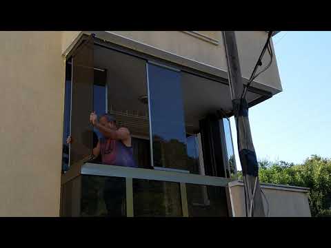 Видео: Безпрофилно остъкляване на тераса тип Стъклена Хармоника