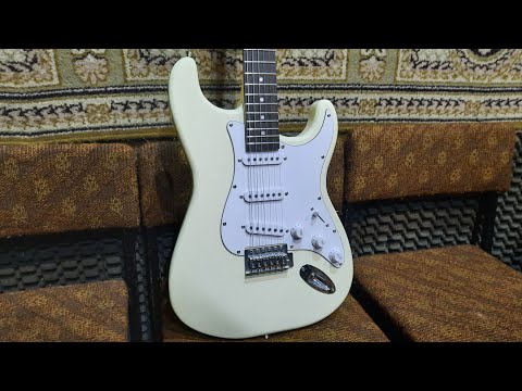 Видео: Гитарное и не только все об инструментах от Олега Ратушного. Fabio St-100 wh. 8 Выпуск 2025.