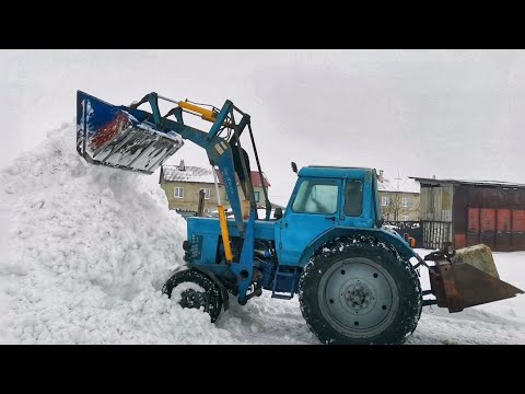 Видео: НАЧАЛО 2021. МТЗ С КУНОМ БЕЗ ПЕРЕДКА ЧИСТИТ СНЕГ