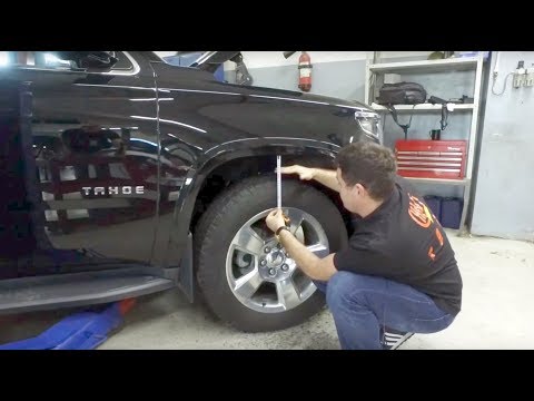 Видео: Тюнинг Chevrolet Tahoe 4 - Установка лифт комплекта для прохождения бездорожья