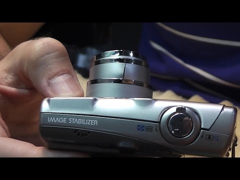 Видео: Сломан и перекошен объектив. Фотокамера Canon Ixus 950 IS. Ремонт