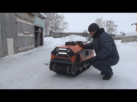 Видео: Мотобуксировщик. Замена масла на Мотобуксировщике