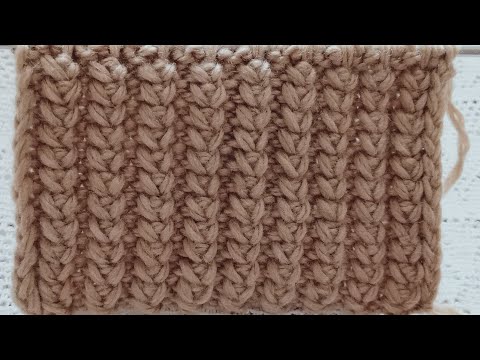 Видео: очень красивая и не обычная резинка спицами.