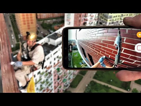 Видео: Герметизация межпанельных швов. Промышленные альпинисты.