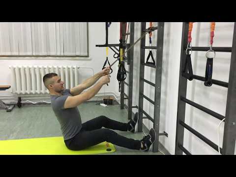 Видео: Упражнения для спины дома. Тяга вертикального блока: тренировка спины с резиновым жгутом!