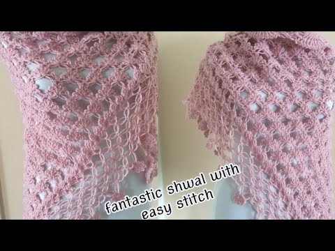 Видео: Изысканная треугольная шаль, связанная крючком с классическим ажурным узором, подойдет для любого...