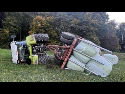 Видео: Трактор против грузовика. Только идиот мог сделать так, чтобы трактор застрял в грязи. Тупой води...
