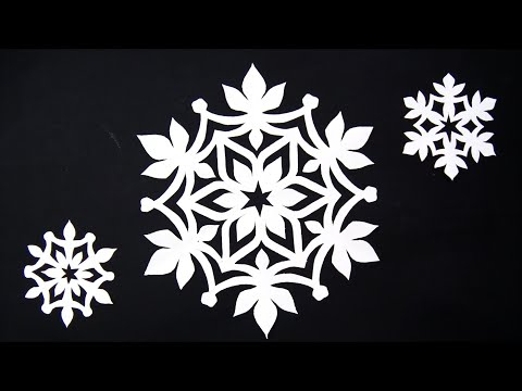 Видео: Как вырезать красивую снежинку из бумаги DIY - Простая снежинка DIY - Простые поделки.