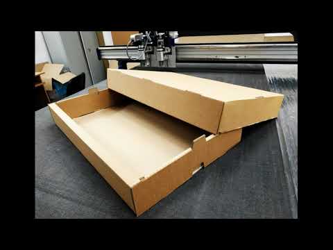 Видео: Изготовление картонных коробок из гофрокартона на планшетном режущем плоттере на фабрике «Кристалл33
