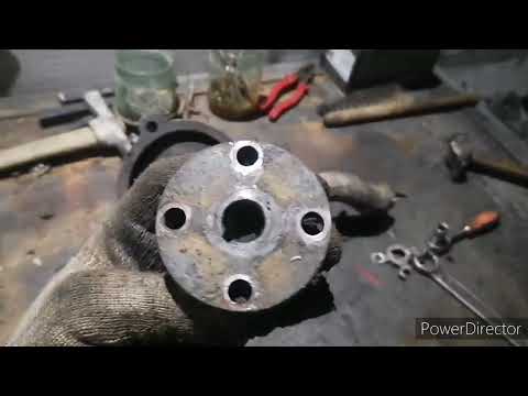 Видео: Ремонт помпы на МТЗ-82
