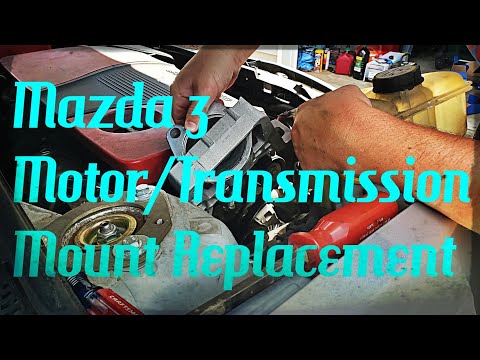 Видео: Замена опор двигателя и коробки передач Mazda 3 2005 года