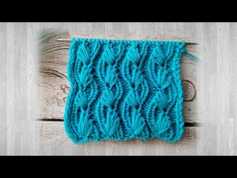 Видео: Шикарный узор 34 спицами Лапки