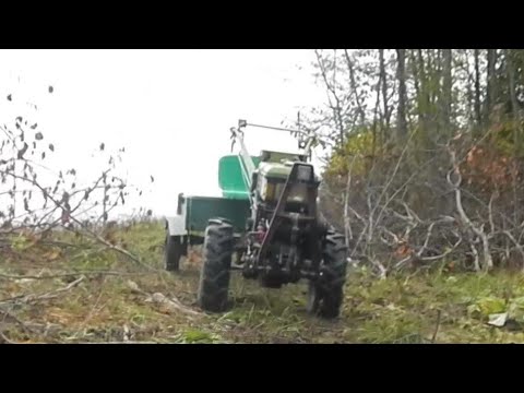 Видео: Расчистка завалов тяжелым мотоблоком с лебедкой
