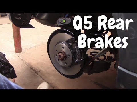 Видео: Замена задних тормозов на Audi Q5