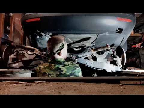Видео: Перебираем заднюю подвеску VAG (многорычажка)