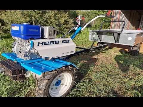 Видео: ЗАМЕНА РЕМНЯ  ПРИВОДА МОТОБЛОКА "НЕВА МБ-2" С ДВИГАТЕЛЕМ YAMAHA MX-200 НАТЯЖКА И РЕГУЛИРОВКА.