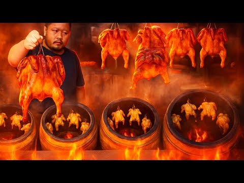Видео: Тайский шеф-повар зажарил 100 цыплят в 6 огромных угольных банках