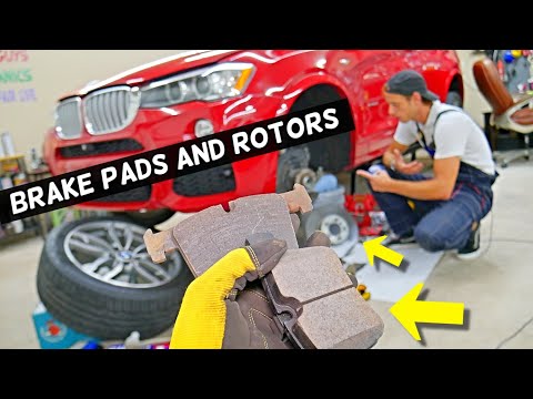 Видео: Замена передних тормозных колодок и дисковых дисков BMW X3 X4 F25 F26 2011 2012 2013 2014 2015 20...