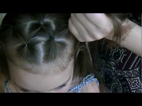 Видео: Прическа с плетением хвостиками