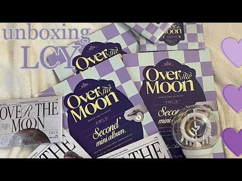 Видео: распаковка ли чеен / lee chaeyeon over the moon & lightstick unboxing 💜