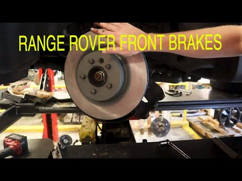 Видео: Замена передних тормозных колодок и ротора Land Range Rover 2011 года