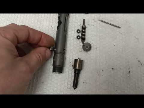 Видео: Устройство форсунки 2.5 TDI V6(AKE,AKN,BDG,BAU....)Чем регулировать? Штифт или шайба?