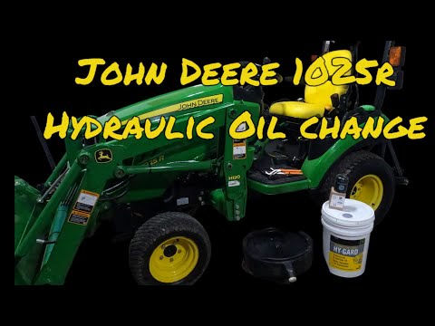 Видео: Замена гидравлического масла и фильтра John Deere 1025r