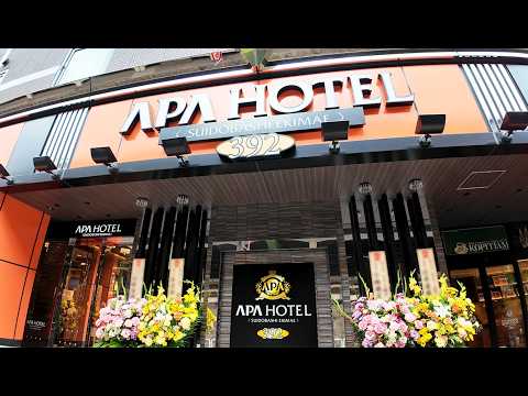 Видео: [ДЕНЬ ОТКРЫТИЯ] Отель в Токио в 30 сек от станции! APA Hotel Suidobashi