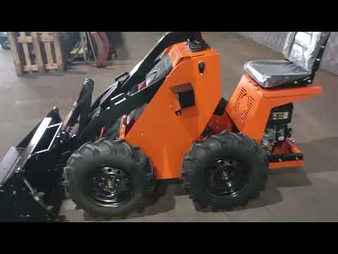 Видео: Минипогрузчик новой модели с сидячим оператором.  Сборка после покраски.