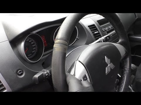 Видео: Mitsubishi Outlander XL - Перетяжка руля и ручки КПП кожей. -