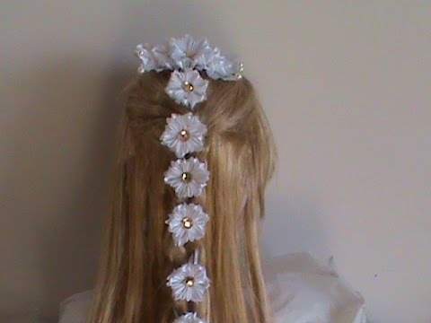 Видео: Несколько вариантов вплетания ленты с цветами канзаши в косу