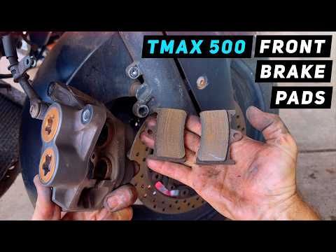 Видео: Yamaha Tmax 500 - Замена передних тормозных колодок | Mitch's Scooter Stuff