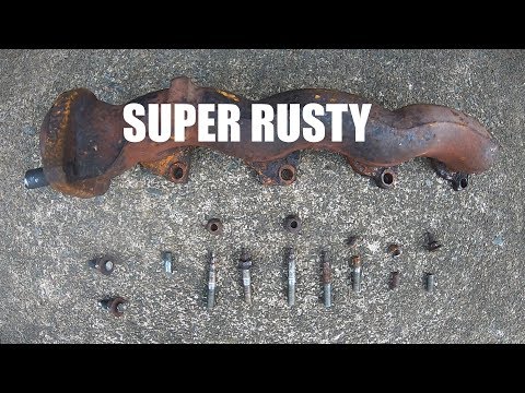 Видео: Снятие выпускного коллектора Ford F150 2003 года