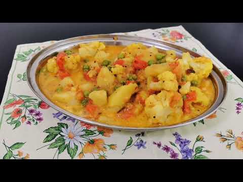Видео: Cauliflower Potato Pea Vegetable / Сабджи из цветной капусты, горошка, картофеля и помидор