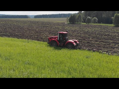 Видео: Пашня на кировце К 742МСт1 с плугом ПЛН 9 35