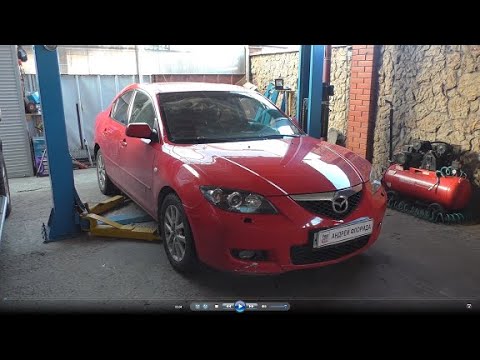 Видео: Снятие и установка генератора на Mazda 3  1,6  Мазда 3  2008 года