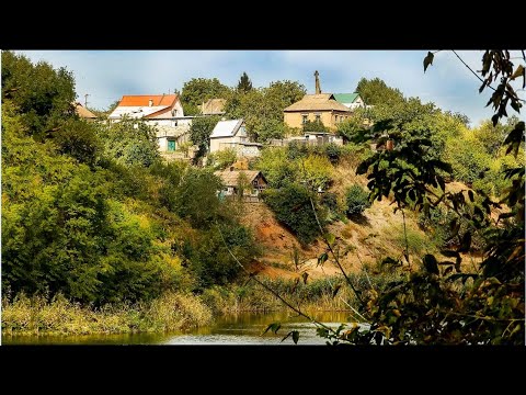 Видео: Обжитый затопленый железорудный карьер. г.Кривой Рог.