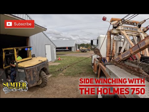 Видео: Боковая лебедка с Holmes 750