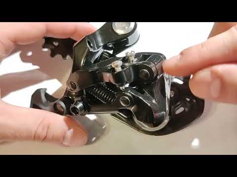 Видео: Обзор заднего переключателя и манетки L-Twoo AX на 11 скоростей