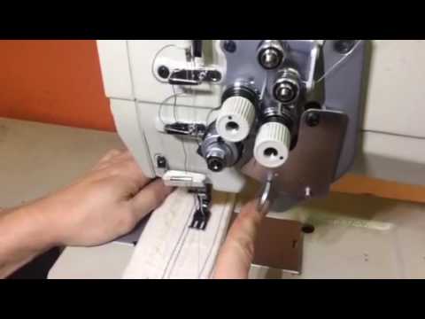 Видео: Двухигольная швейная машина с игольным продвижением и отключением одной из игл AURORA A-875