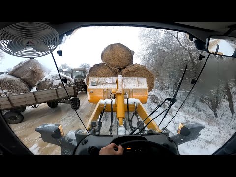 Видео: Затаскиваю груженные трактора на подъем!