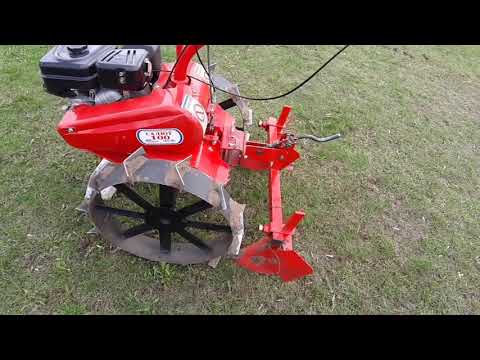 Видео: Окучник двухрядный