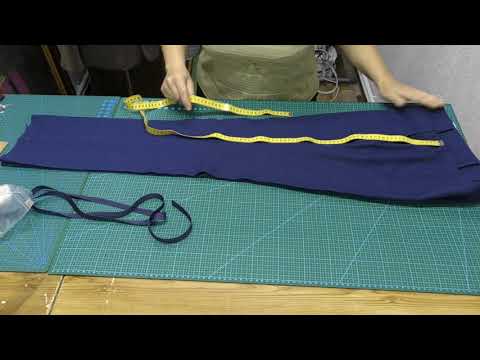 Видео: Обработка низа брюк с брючной тесьмой.